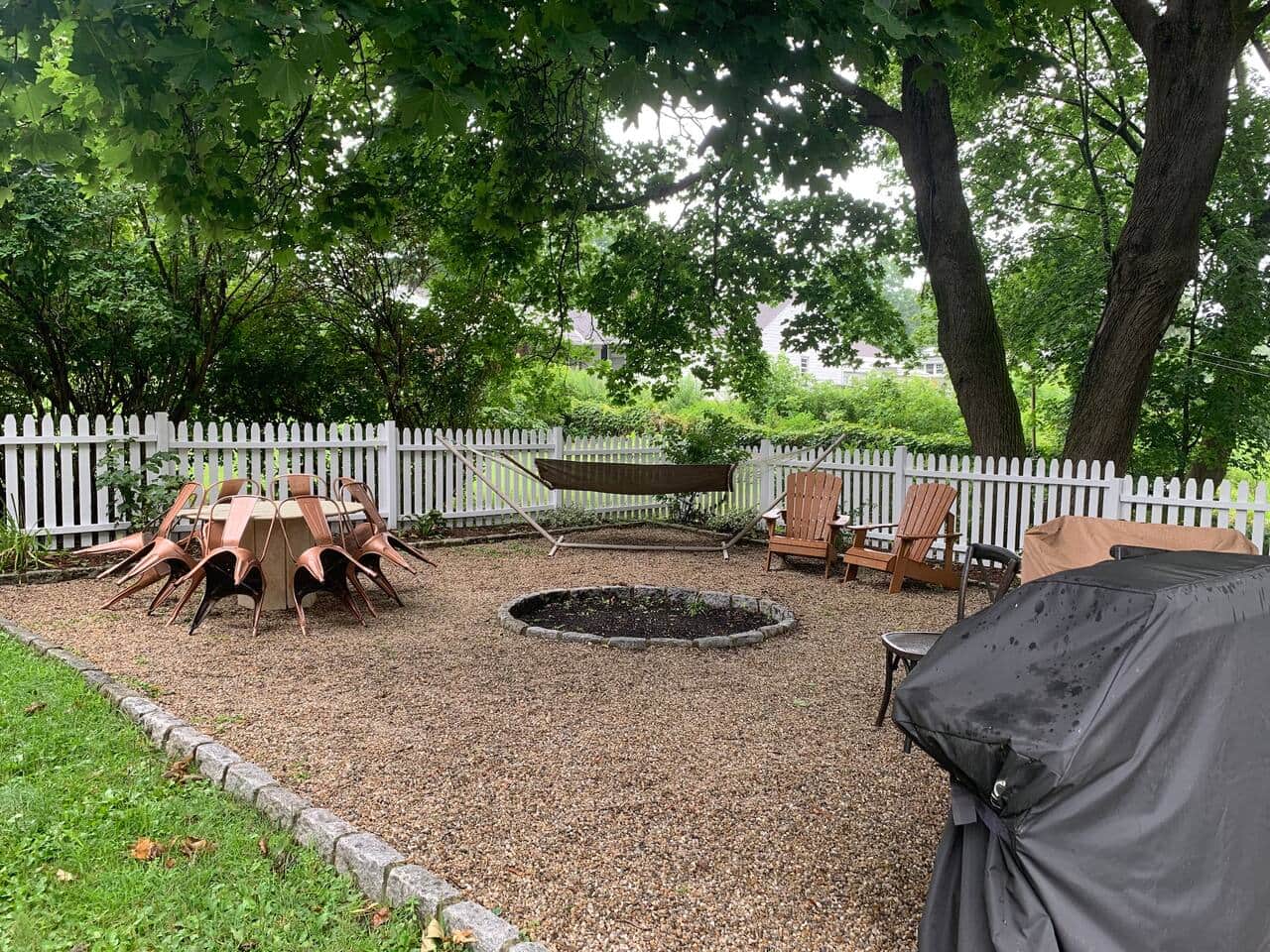 Backyard with hammock, BBQ, plenty of seating for enjoying outside. 