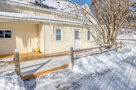 A large deck for warm weather enjoyment.
