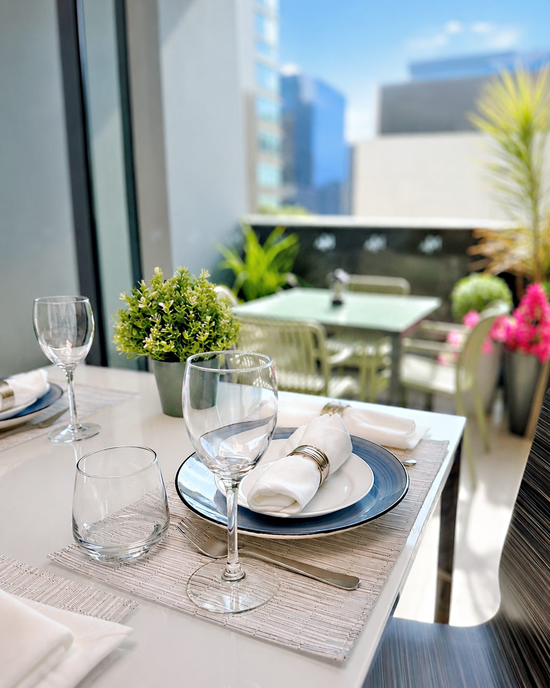 Dining area next to the balcony with table for 4.