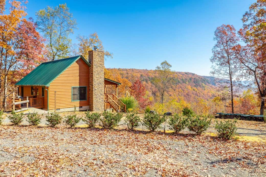 Cast Iron Cabin as you approach from the driveway. A secluded lot on 11 acres, great views and perfect for a cozy getaway.