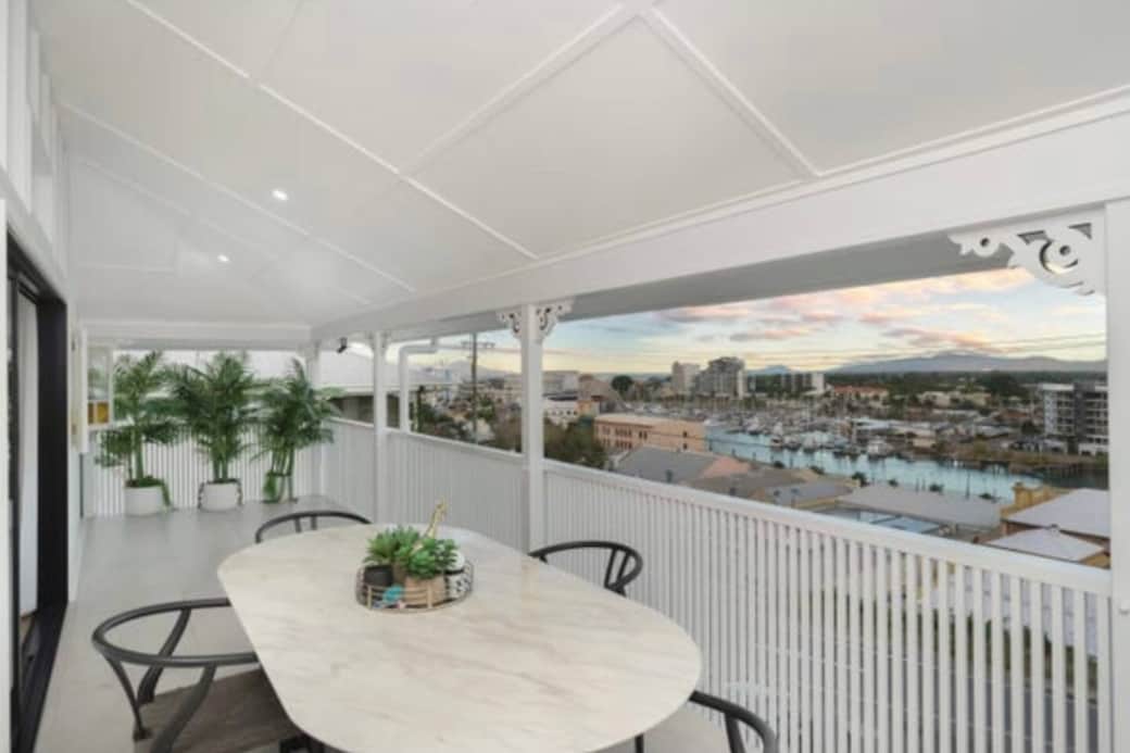 Upstairs deck with views of river and city Upstairs deck with views of river and city