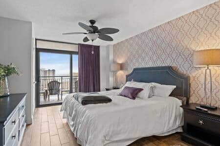 King bed in Main bedroom. Balcony leads to ocean view. King bed in Main bedroom. Balcony leads to ocean view.