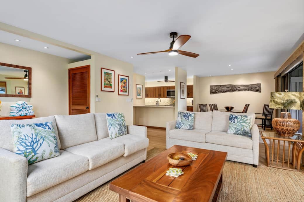 Comfortable living room for relaxing with your family features a new matching couch and sofa/sleeper