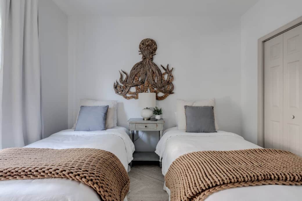 Second floor guest room with two twin beds, tv and private bathroom. Second floor guest room with two twin beds, tv and private bathroom.