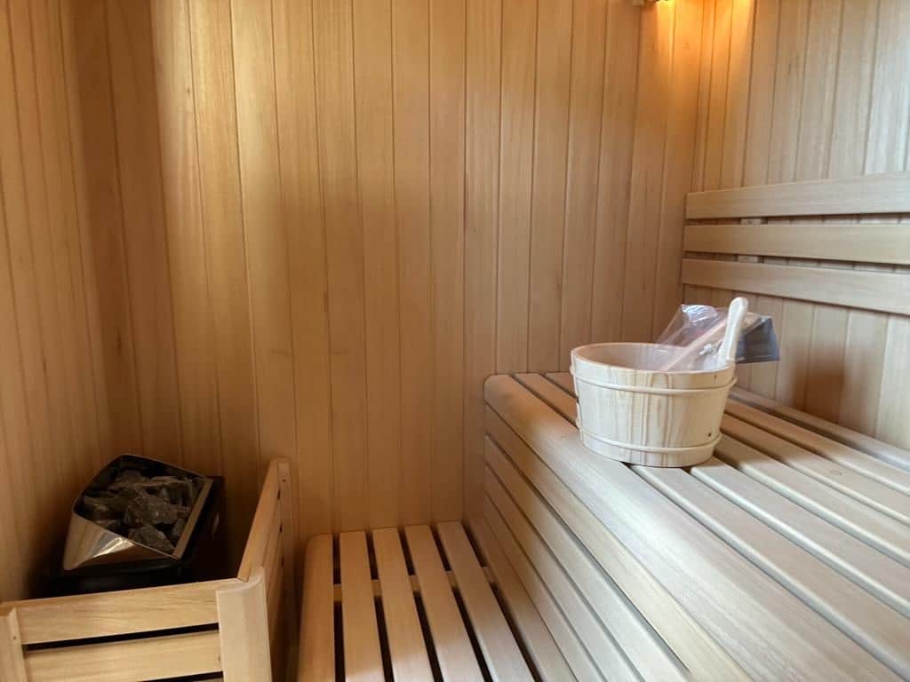 Outdoor sauna next to heated pool in private villa La Herradura