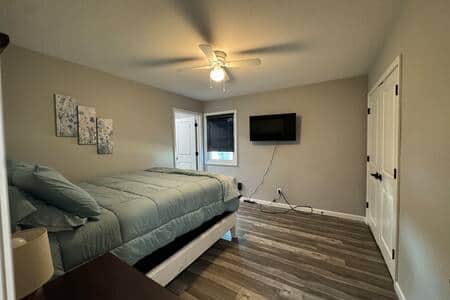 This cozy bedroom is designed for rest and relaxation.  With a Flatscreen TV for you to enjoy!