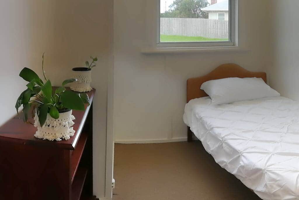 Room with a single bed.