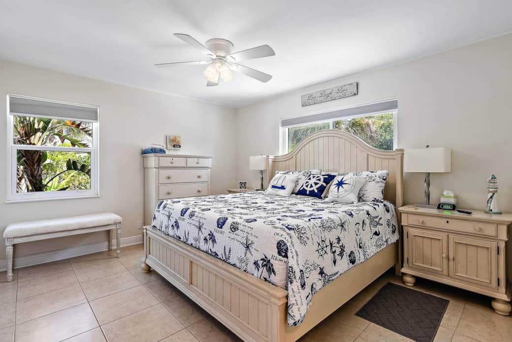 Master Bedroom with King size bed and beautiful views of the backyard. Blinds close to black out the room for late morning sleepers and a large closet is available to store your luggage. Also attached is a private half bathroom.