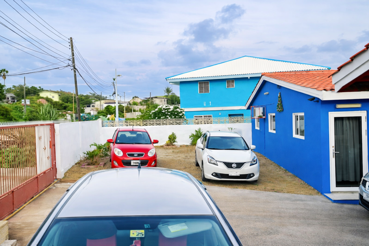 Free on-site parking in the gated yard.