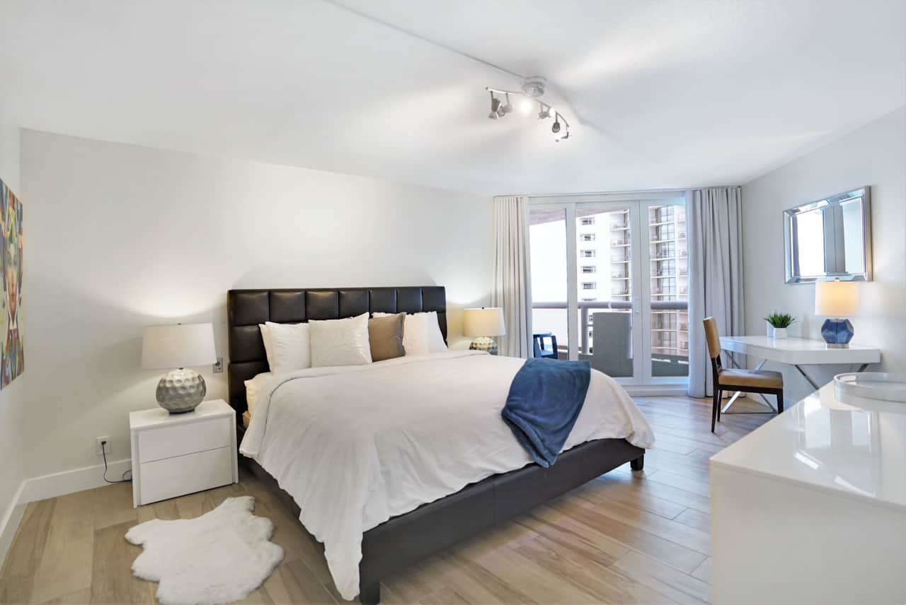 Master bedroom, king bed, desk, private balcony and bathroom, tv, walk in closet