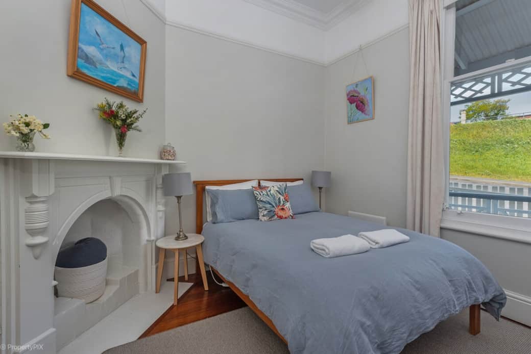 Bedroom one has a double and a king single bed