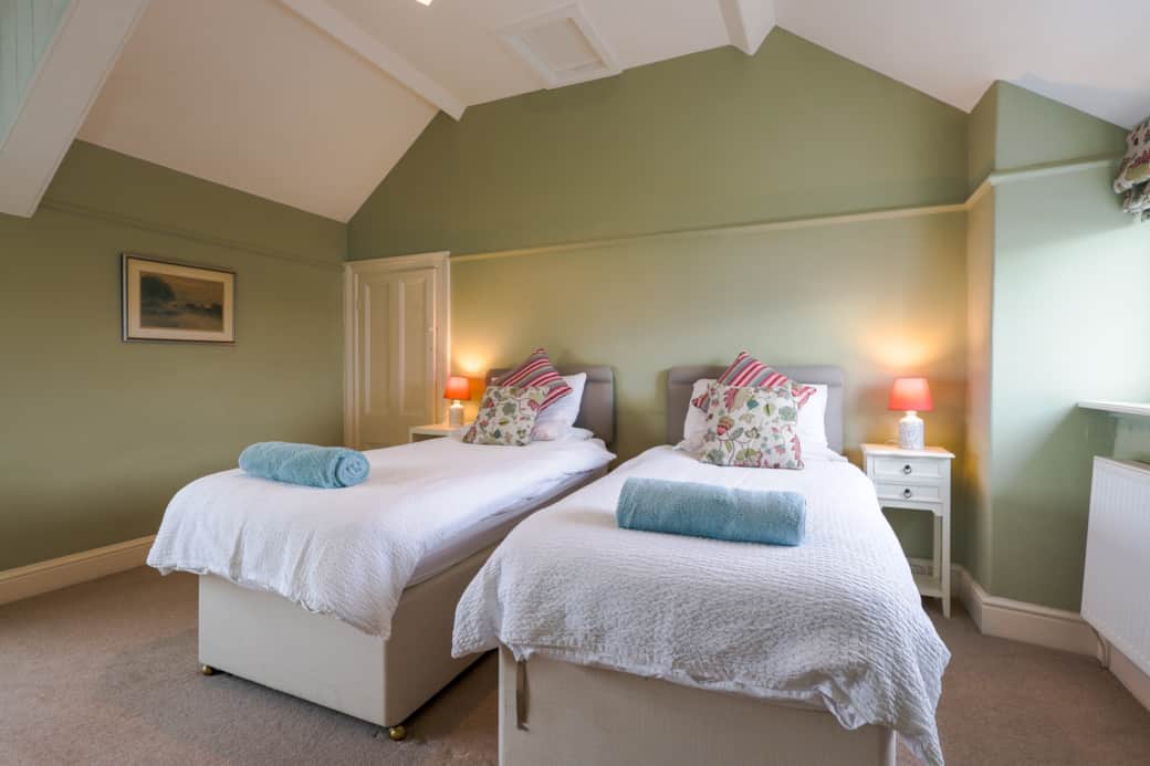 Bedroom 1 with 2 single beds