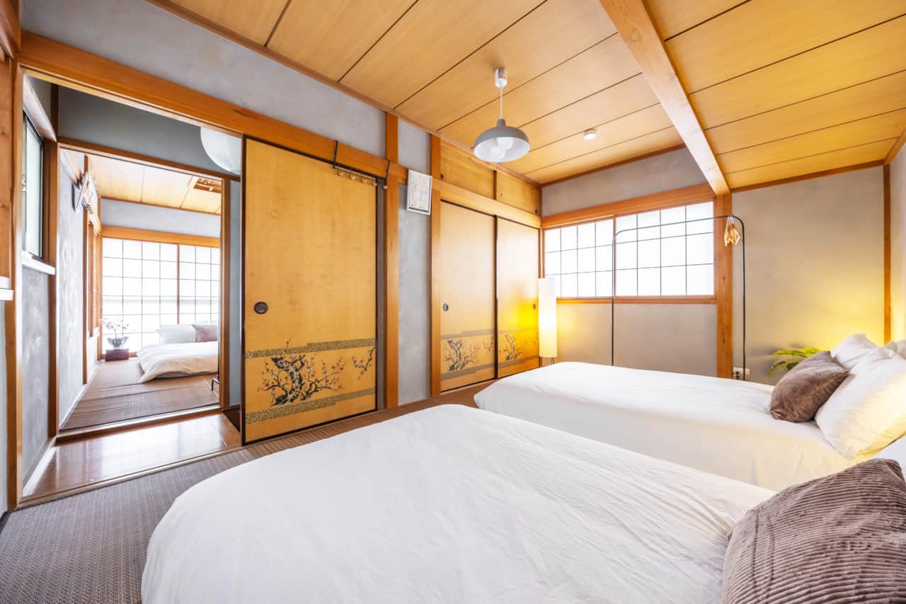 Interconnected japanese bedroom two double beds family friendly