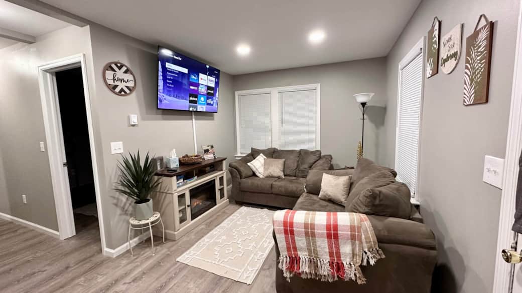 Living Room Area: 58 inch Smart TV | Electric Fire Place