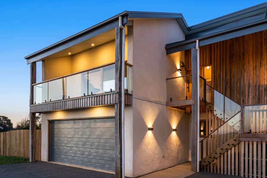 Evening view of apartment and staircase. Evening view of apartment and staircase.