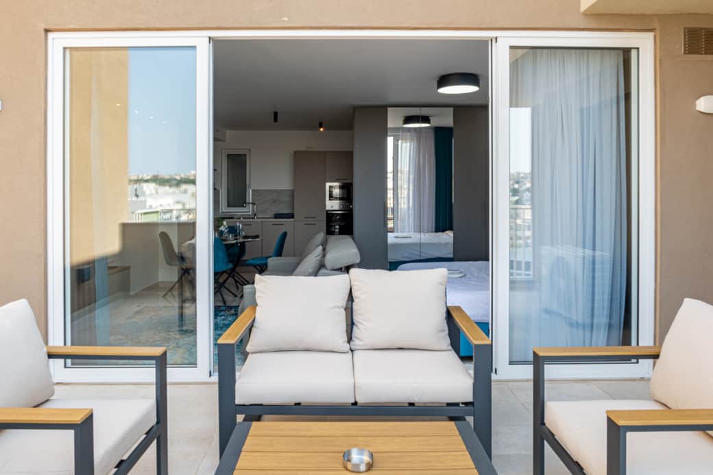 Enjoy the sunny terrace with city views