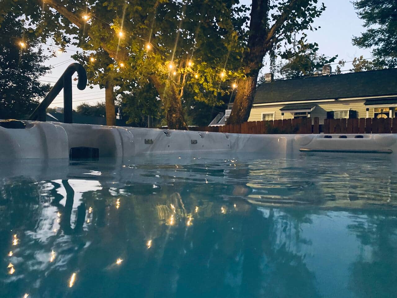 Evenings at The Hourglass Inn — unwind under the string lights in our heated swim spa ✨
