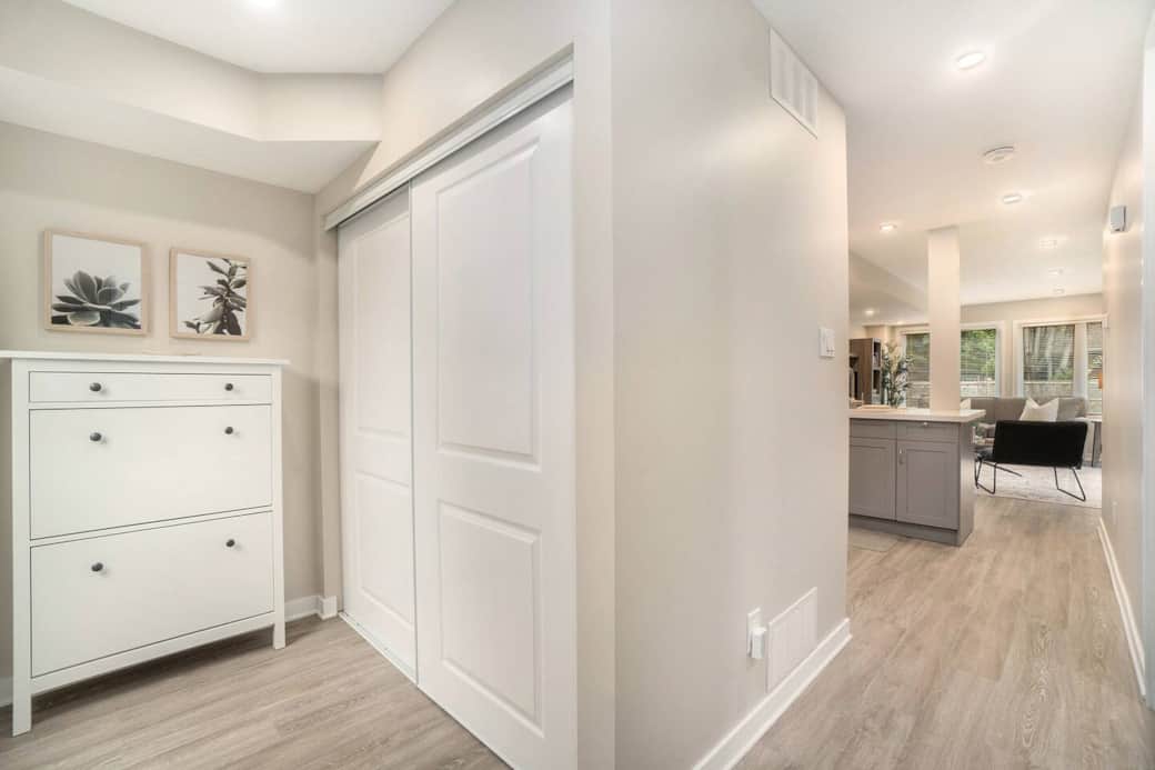 Entryway with double sliding closet doors and new luxury vinyl plank floors throughout. Entryway with double sliding closet doors and new luxury vinyl plank floors throughout.