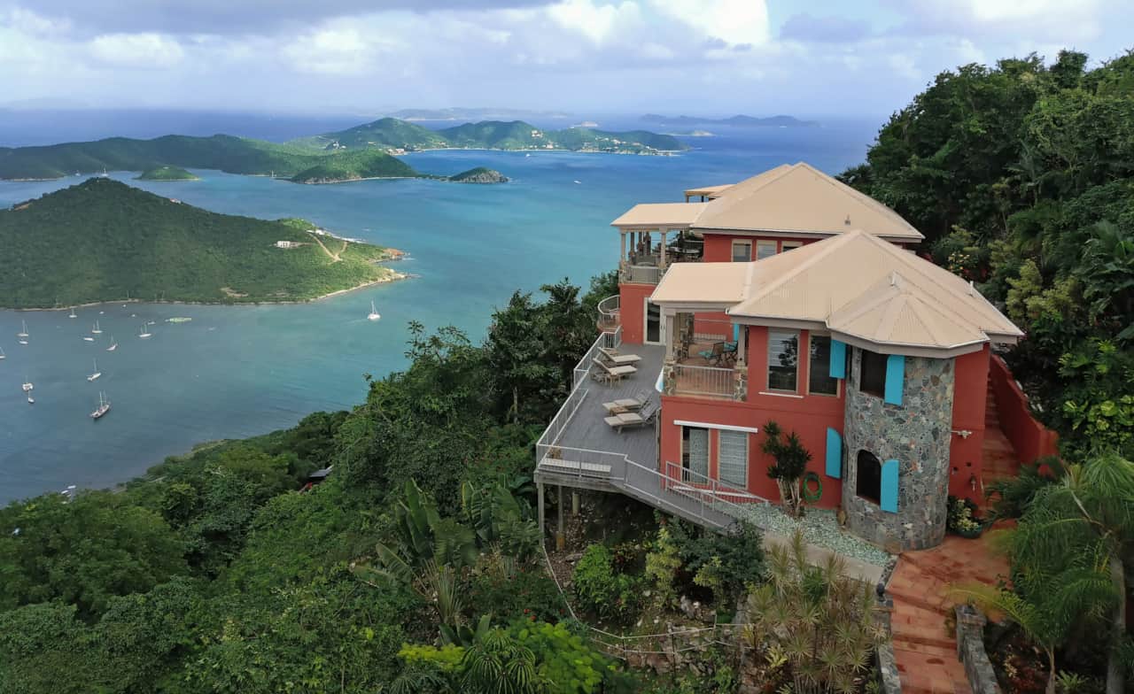 Caribbean breezes flow up the mountain, cooling the villa