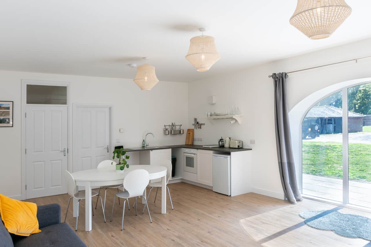 The kitchen and dining area of the open-plan living