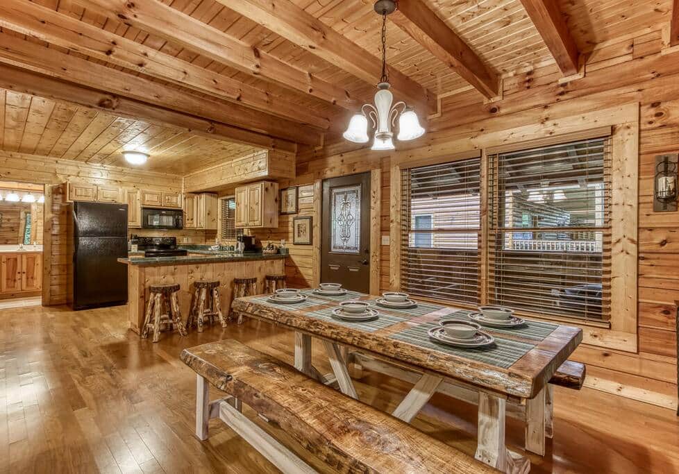 Live edge dining room table with bench seating. Live edge dining room table with bench seating.