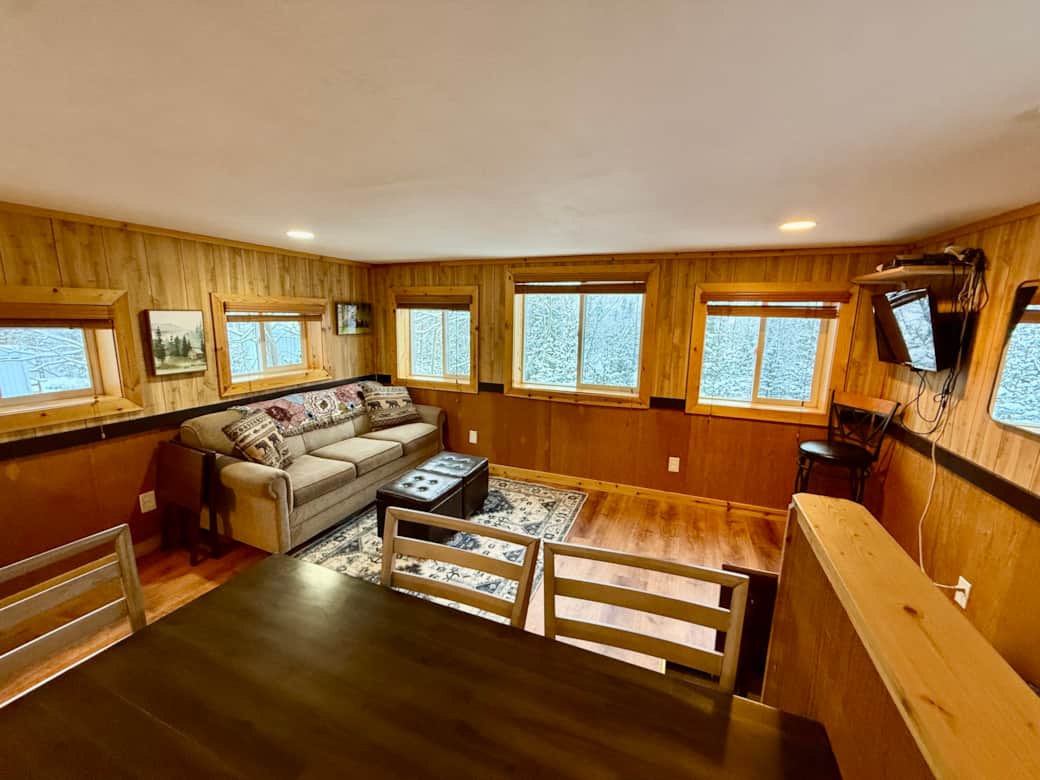 open living room with mountain views and TV open living room with mountain views and TV