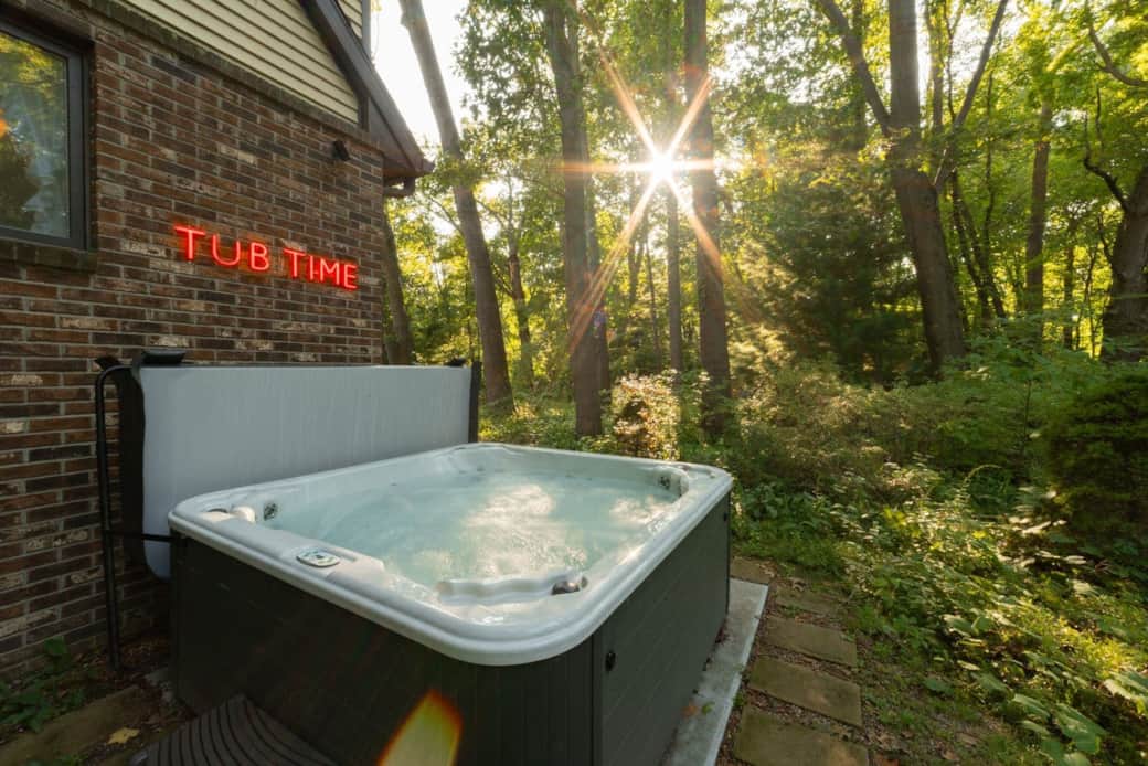 Secluded outdoor hot tub surrounded by trees near Lake Michigan Secluded outdoor hot tub surrounded by trees near Lake Michigan