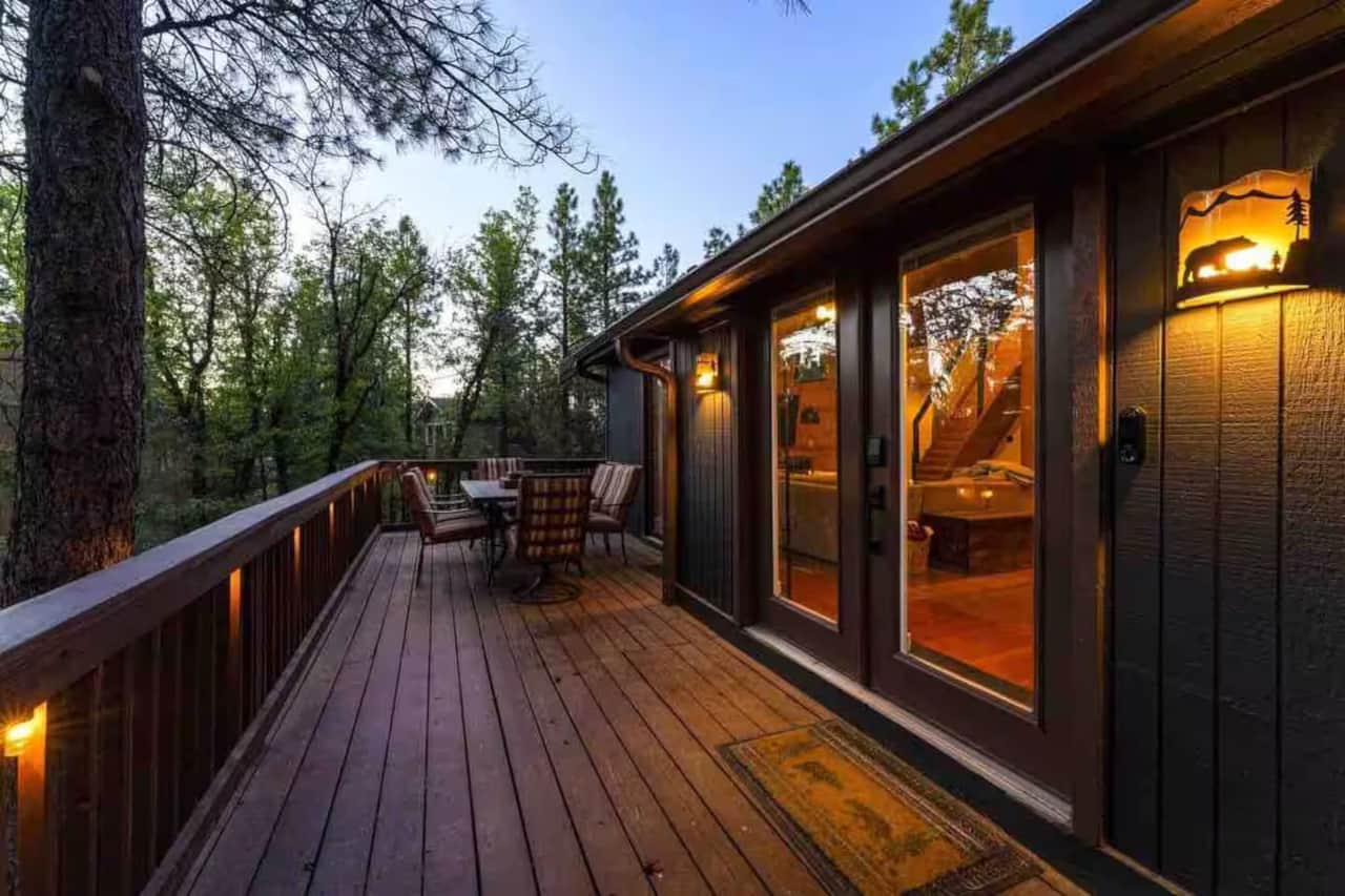 Balcony view at dusk overlooking forest in Munds Park Arizona