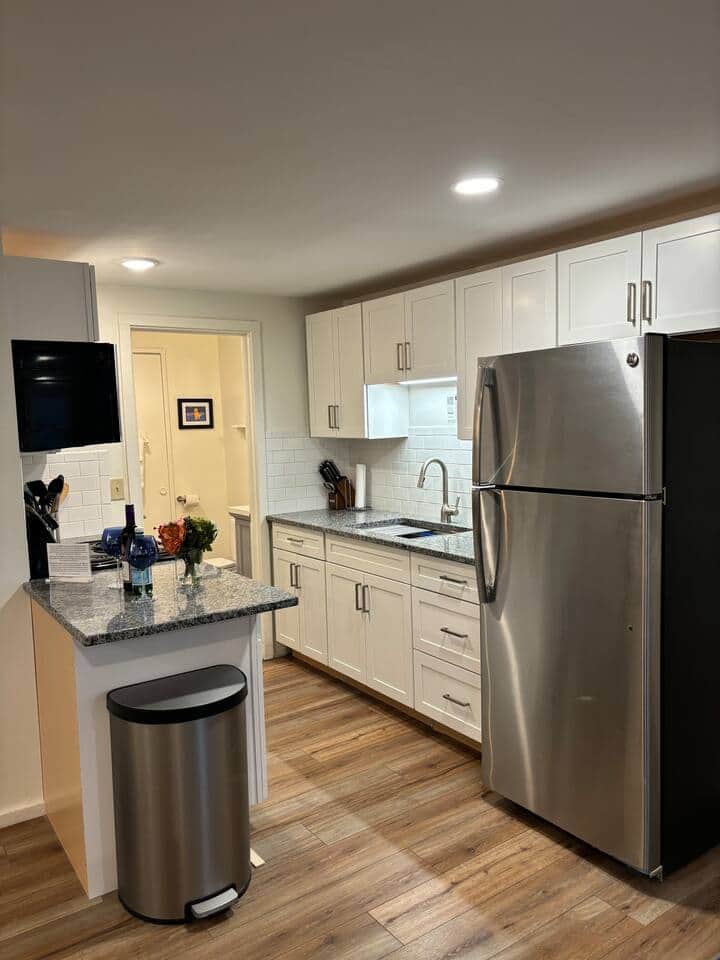 You will love this compact kitchen with granite countertops and gourmet touches everywhere