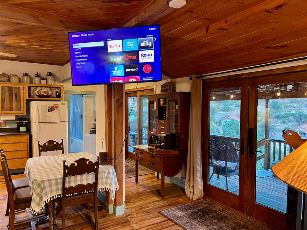 We've outfitted our space with a coffee bar, so you can sip your favorite beverage on our deck. The Smart TV uses Roku so you can stream your favorite channels. 
