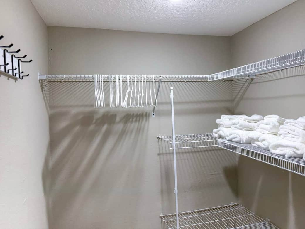 Mia Room - This spacious bedroom features 3 full-size beds, a walk-in closet, and a smart TV.