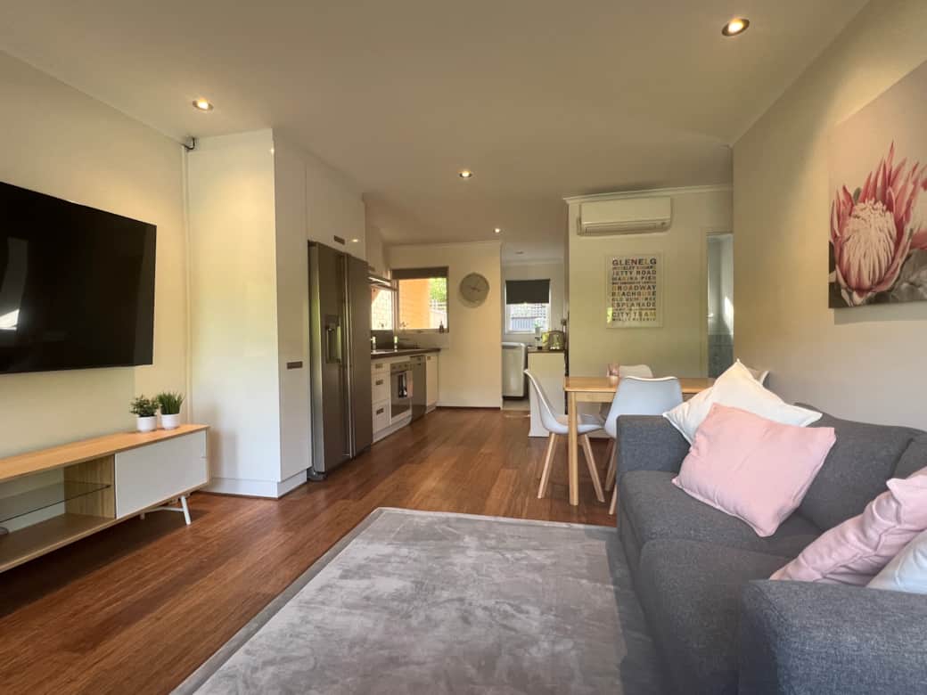 TrooBloo Glenelg North Unit | Living area showing the lounge, dining and kitchen TrooBloo Glenelg North Unit | Living area showing the lounge, dining and kitchen