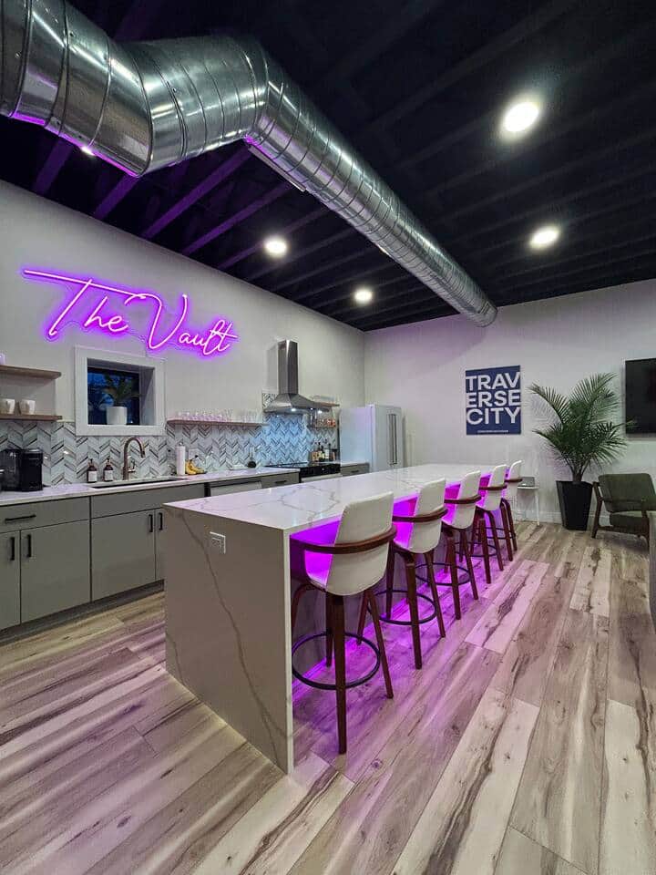 Beautiful Kitchen featuring a 12 foot quartz island and brand new appliances!  The Samsung Range has a built in airfryer for those late night snacks!  2 TV's in view when there are multiple games on with 6 swivel barstools for the whole crew.