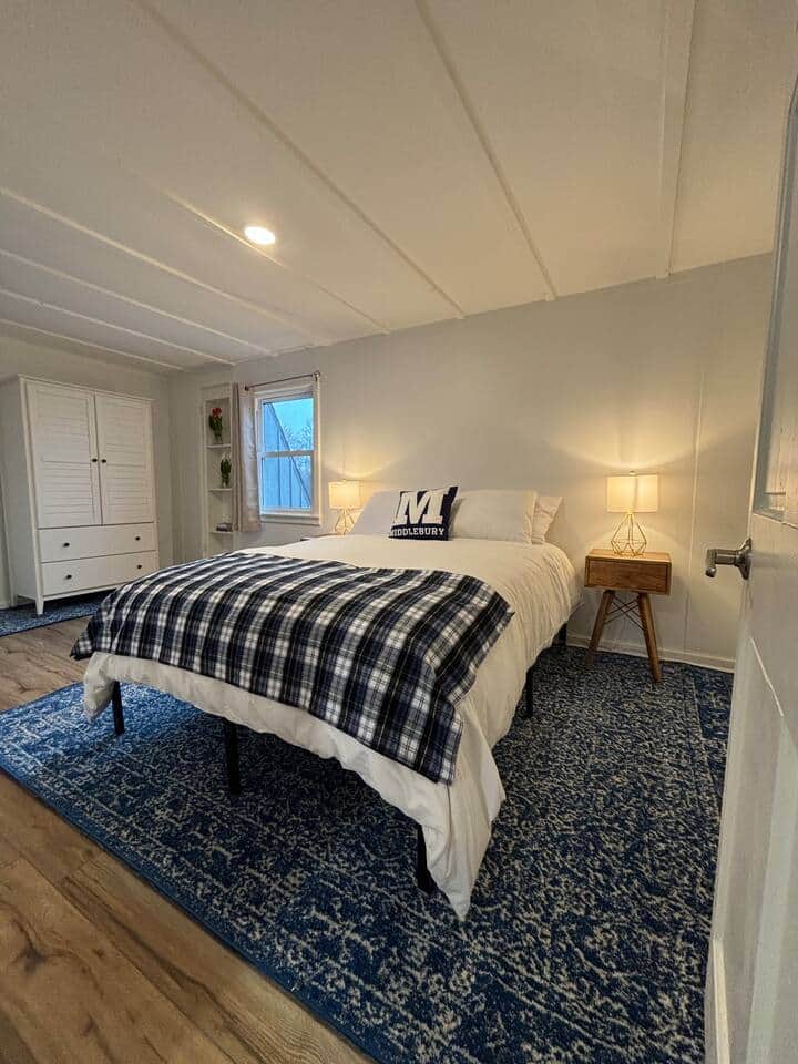 Bedroom two is well equipped with a brand new queen size bed, two nightstands, and a large wardrobe