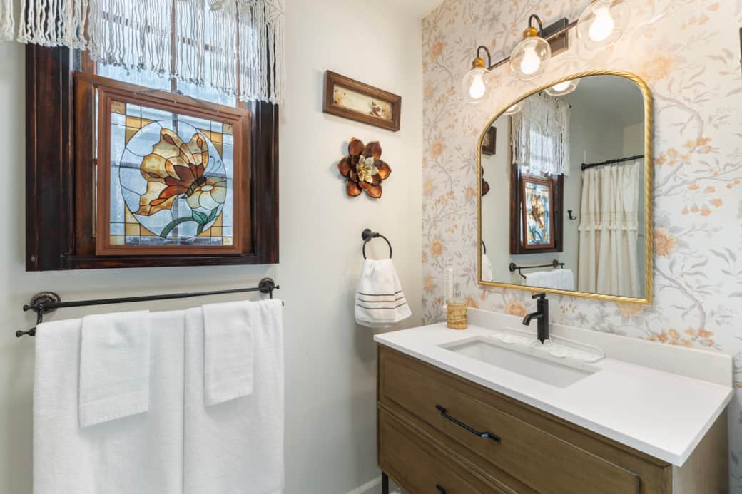 Newly remodeled Bathroom 1 with walk in shower and plenty of towels.
