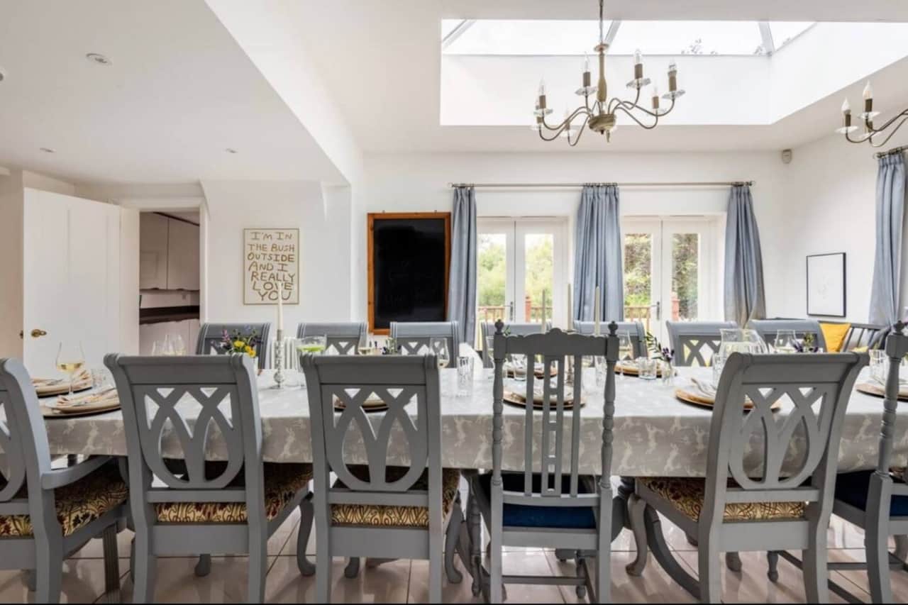 The main dining room, with a large table seating up to 18