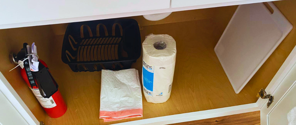 Cutting board, fire extinguisher, plastic bags, and disposable paper towels. Lakeland, FL