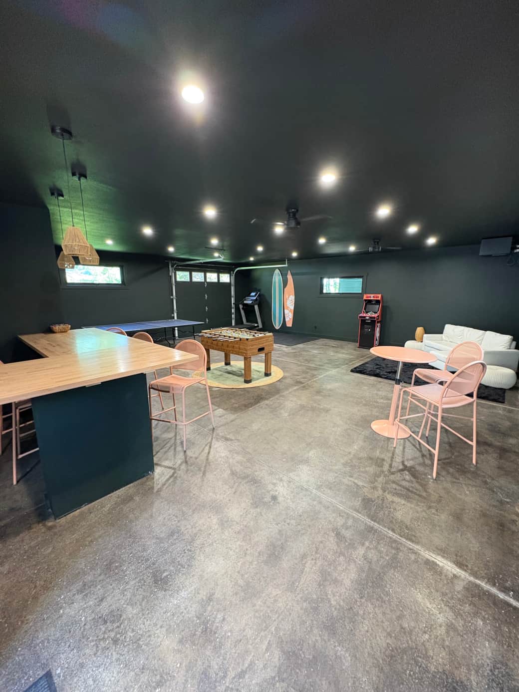 Separate party room with ping pong, foosball and bar area