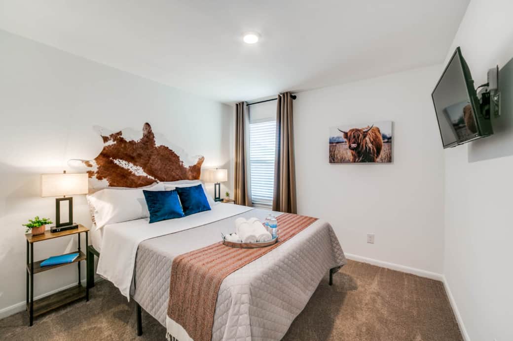 2nd Queen bedroom includes a 32" TV, room darkening blinds and curtains