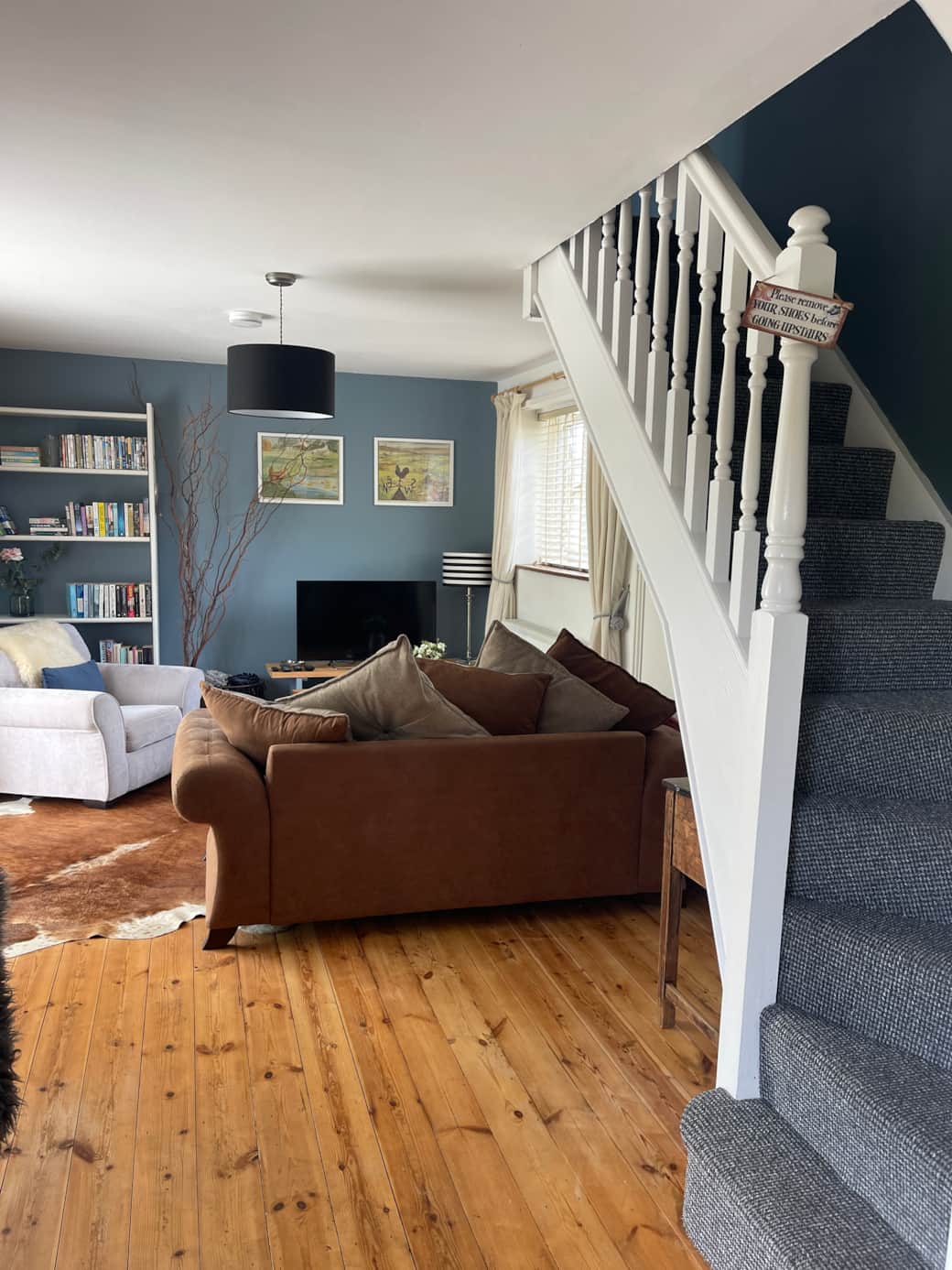 The sitting room is light and airy with patio doors onto the terrace.