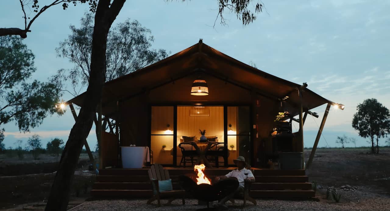 Tent at night with fire