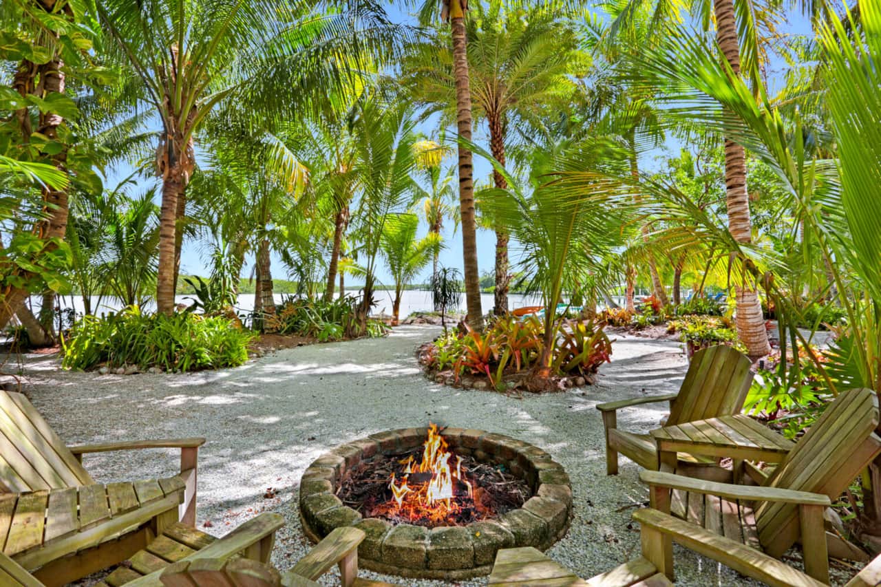 Gorgeous tropical landscape and firepit on the water