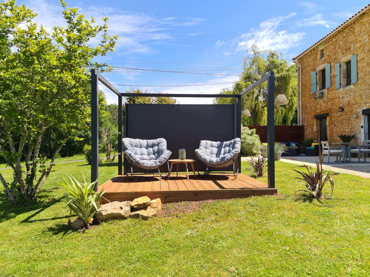 La Prairie's private pergola with comfortable seating and garden views