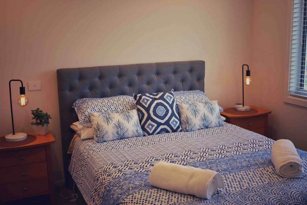 Queen bed in master bedroom with linen provided