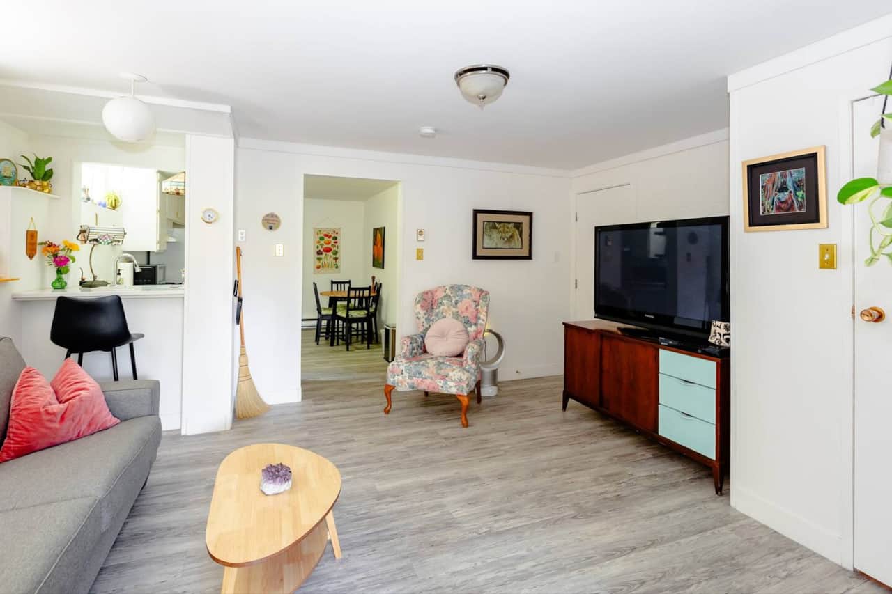 Spacious Living Room with large TV with CBC Gem and a selection of DVDs