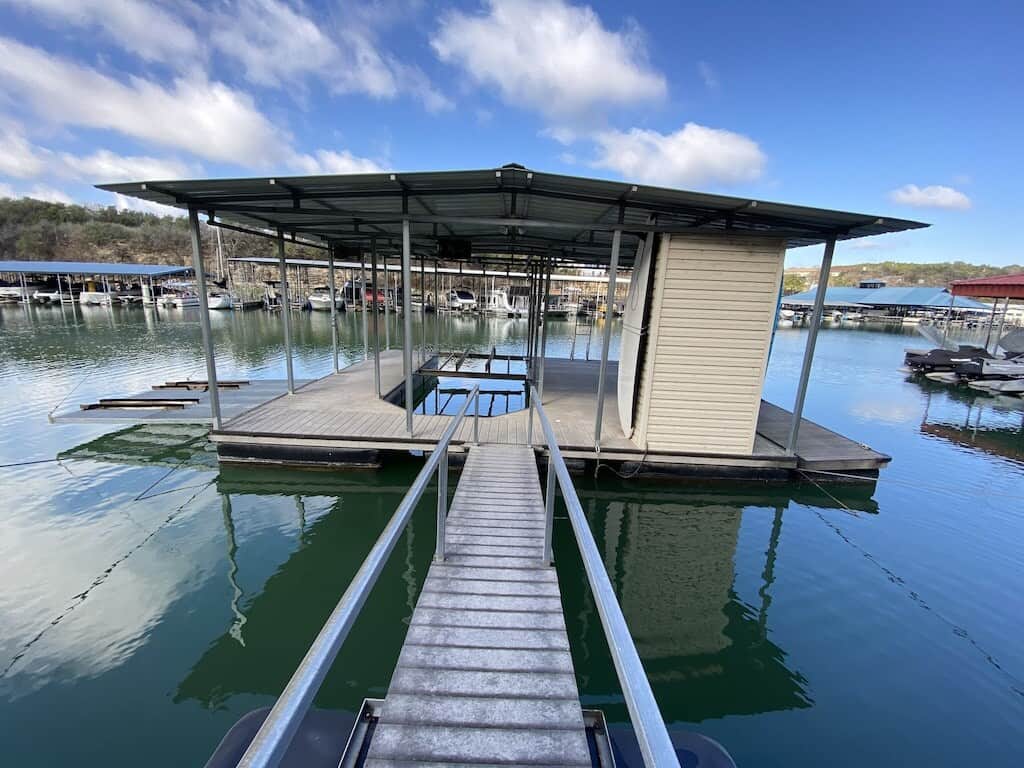 Private covered dock with boat lift and PWC lift on Lake Travis
