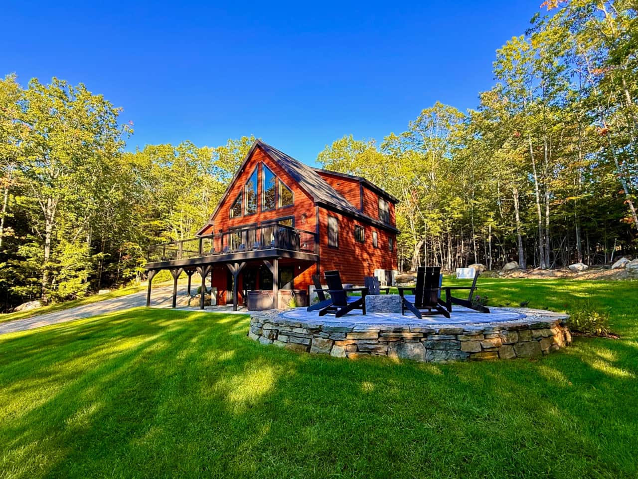 Acorn Haus and the private fire pit surrounded by Maine woods
