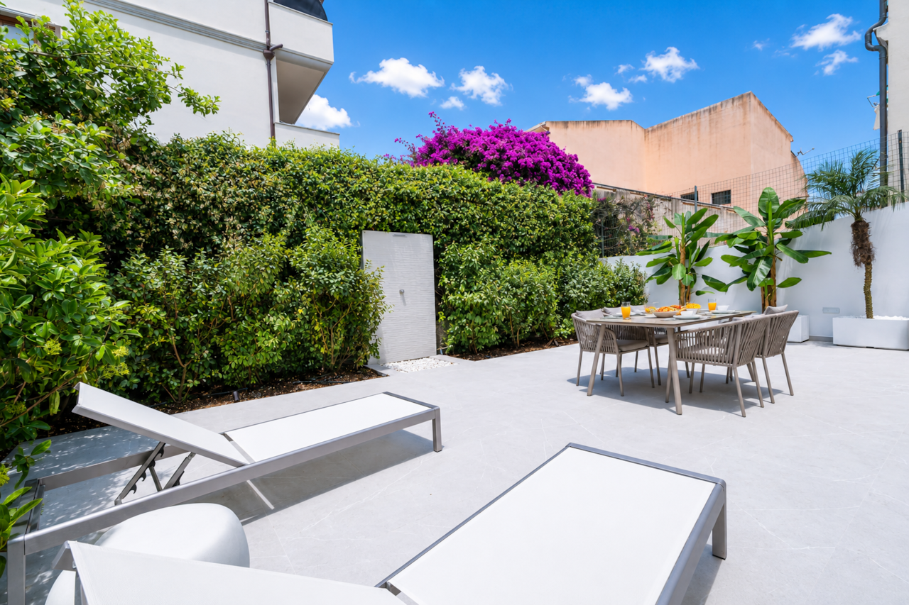 AZULIS DelleTerme Suites Apartment1 open outdoor terrace area with rain shower and 4 person dining t