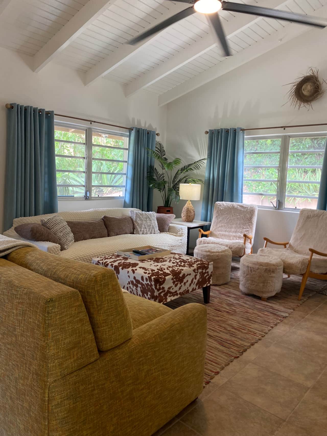 living room with sofa, sofa bed and 2 chairs