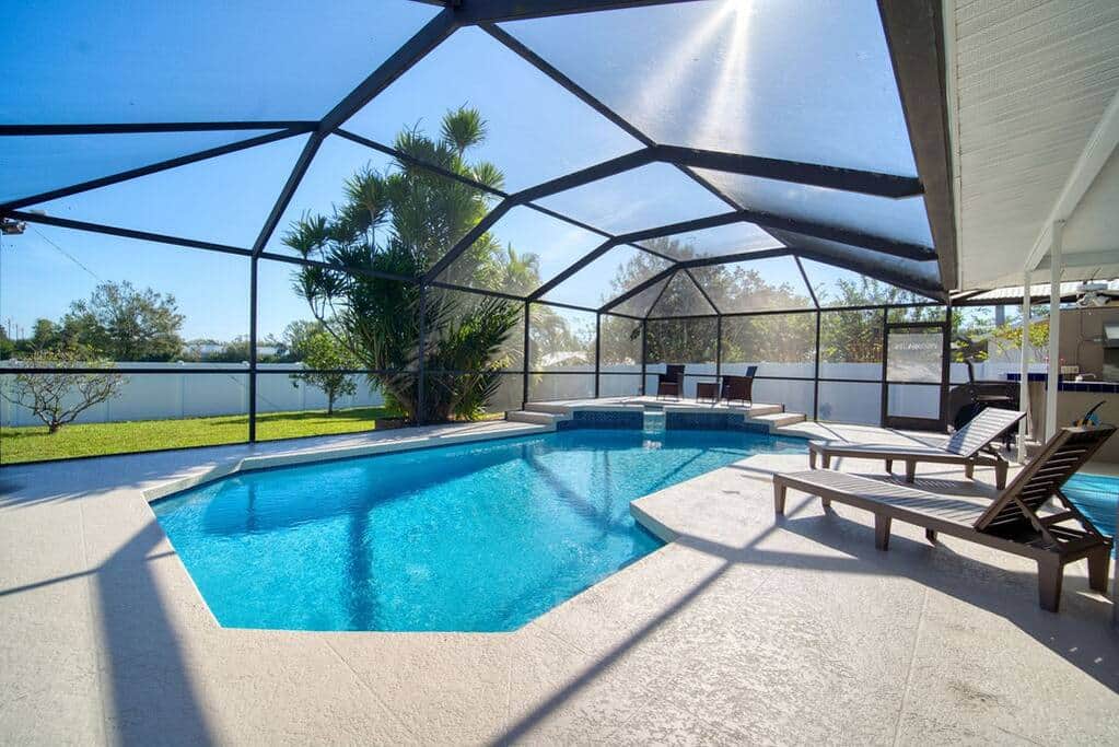 Screened Enclosure over newly resurfaced pool and hot tub